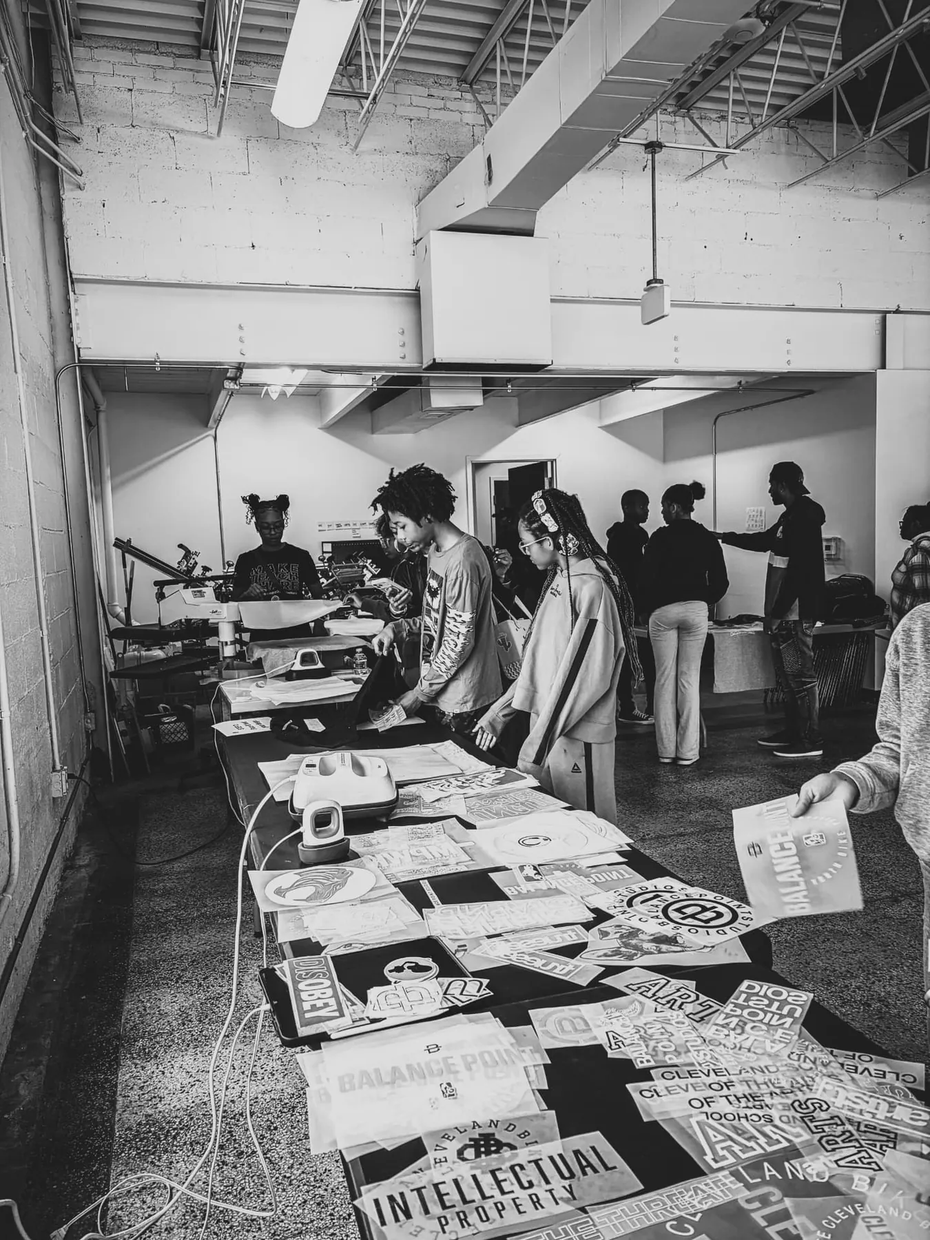 The long print table covered with transfers on demo day.